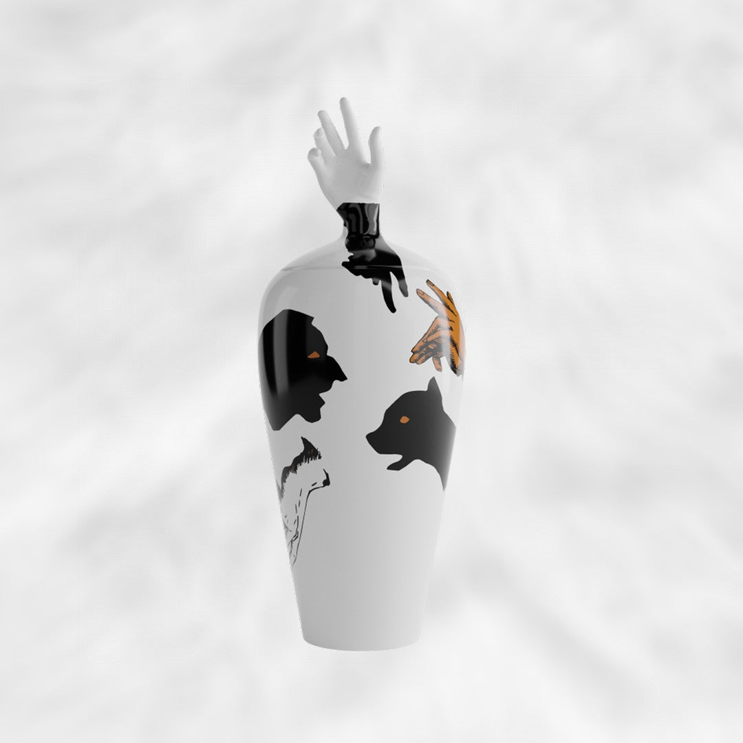 Tall ceramic jar with a hand-shaped lid and shadow puppet-inspired illustrations.