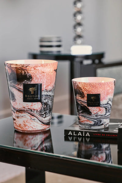 The Delta Zambeze candle collection from Baobab on a modern design console table in luxury interiors
