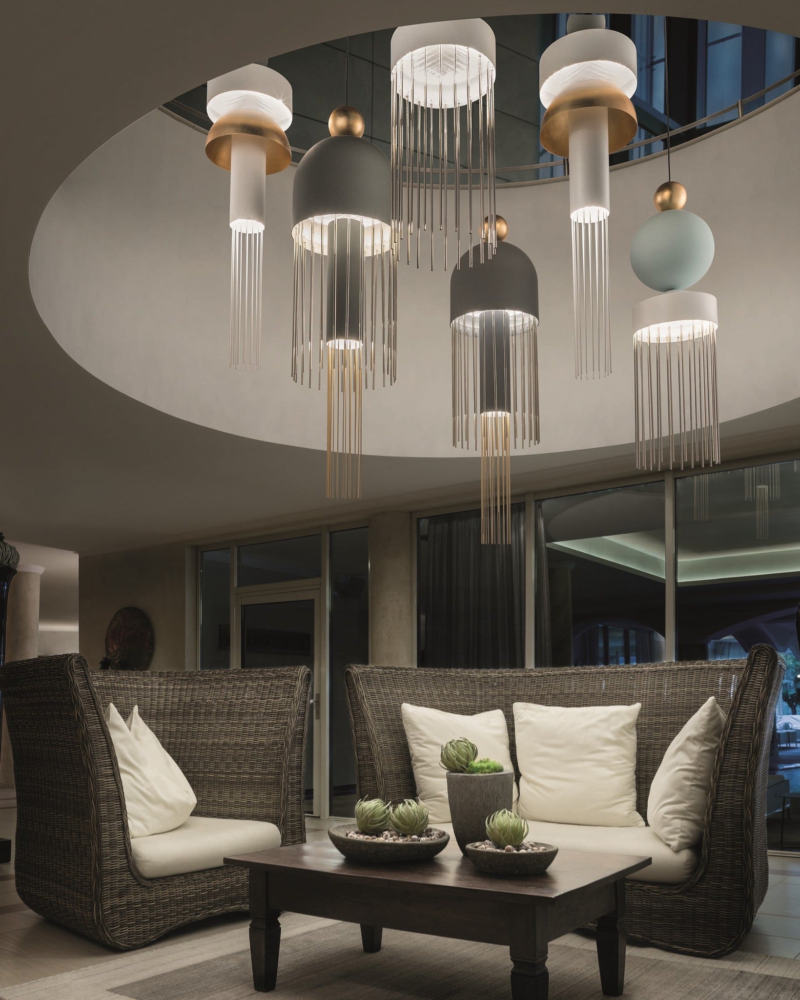 Nappe Luxury Chandelier from Masiero, Italy in a living room interior available at Spacio India for luxury home decor collection of Decorative Lighting.