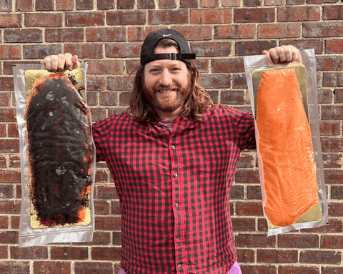 Man holding smoked salmon