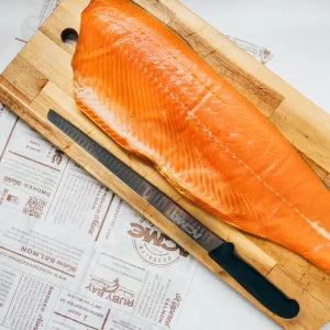 smoked salmon on wooden board