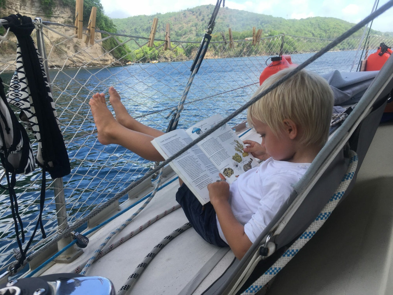 Kilian with Family reading while anchored 