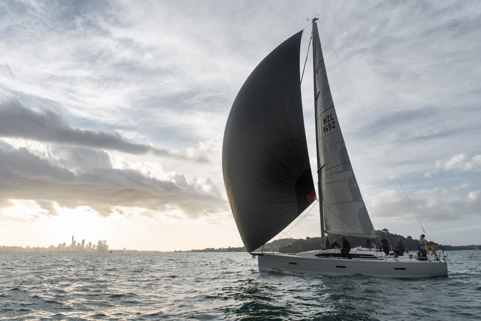 spinnaker dinghy sailboat