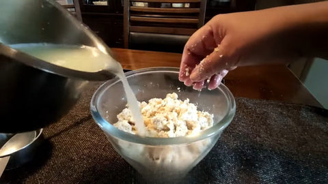 Keep adding paneer water while mixing to make the batter moist.