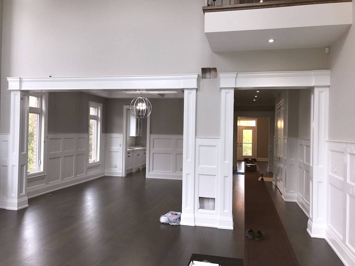 Interior square panelled wall columns in doorways