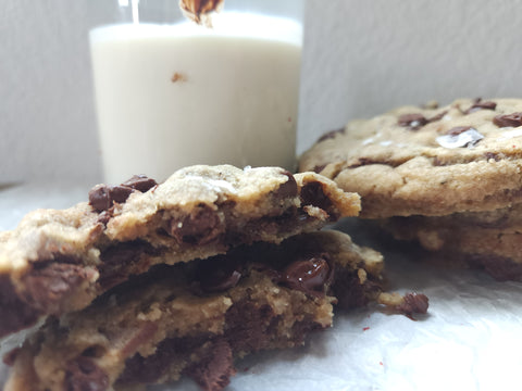 Chocolate chip cookies with a glass of milk