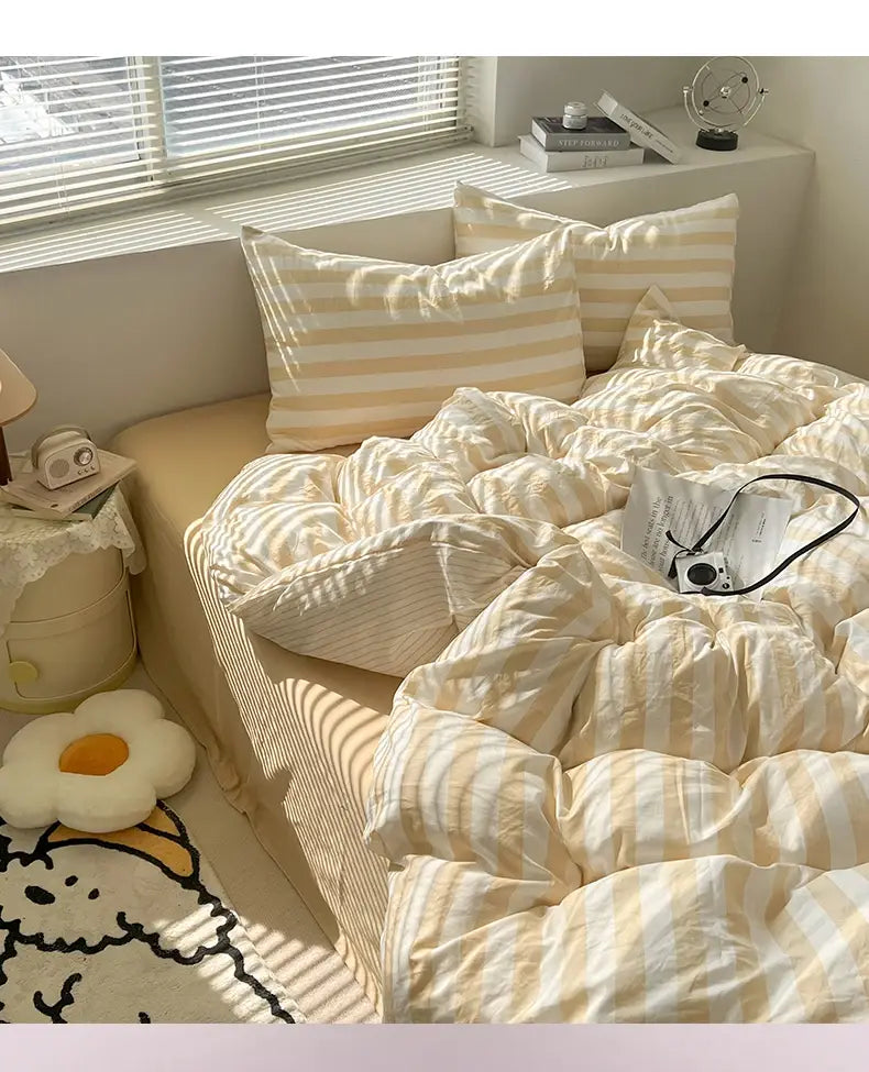Juego de edredón a rayas con fundas de almohada y sábana