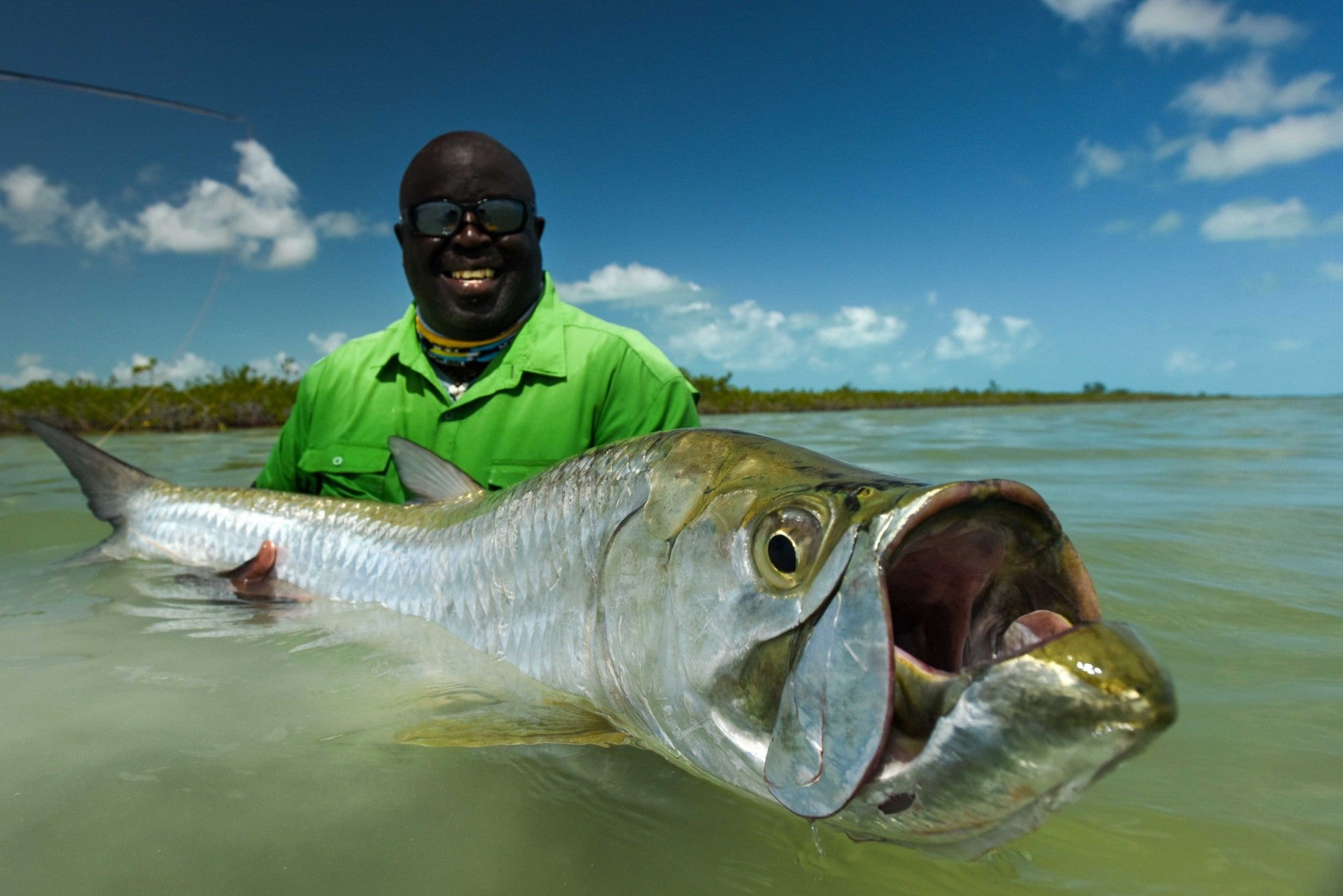 https://cdn.shopify.com/s/files/1/0689/7464/1466/files/bahamas_red-bay-sunset-lodge_tarpon_ian-davis_2019_6-1800x1201.jpg?v=1686160308