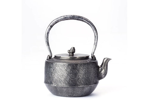 Yamagata cast iron kettle decorated with tortoise shell crest