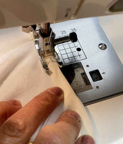 Sewing hands making a prototype