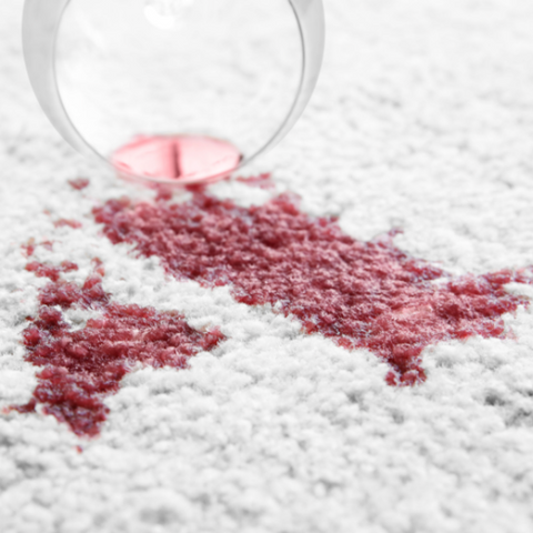 wine spilt on a rug. don't blot these. Just soak in water and baking soda.