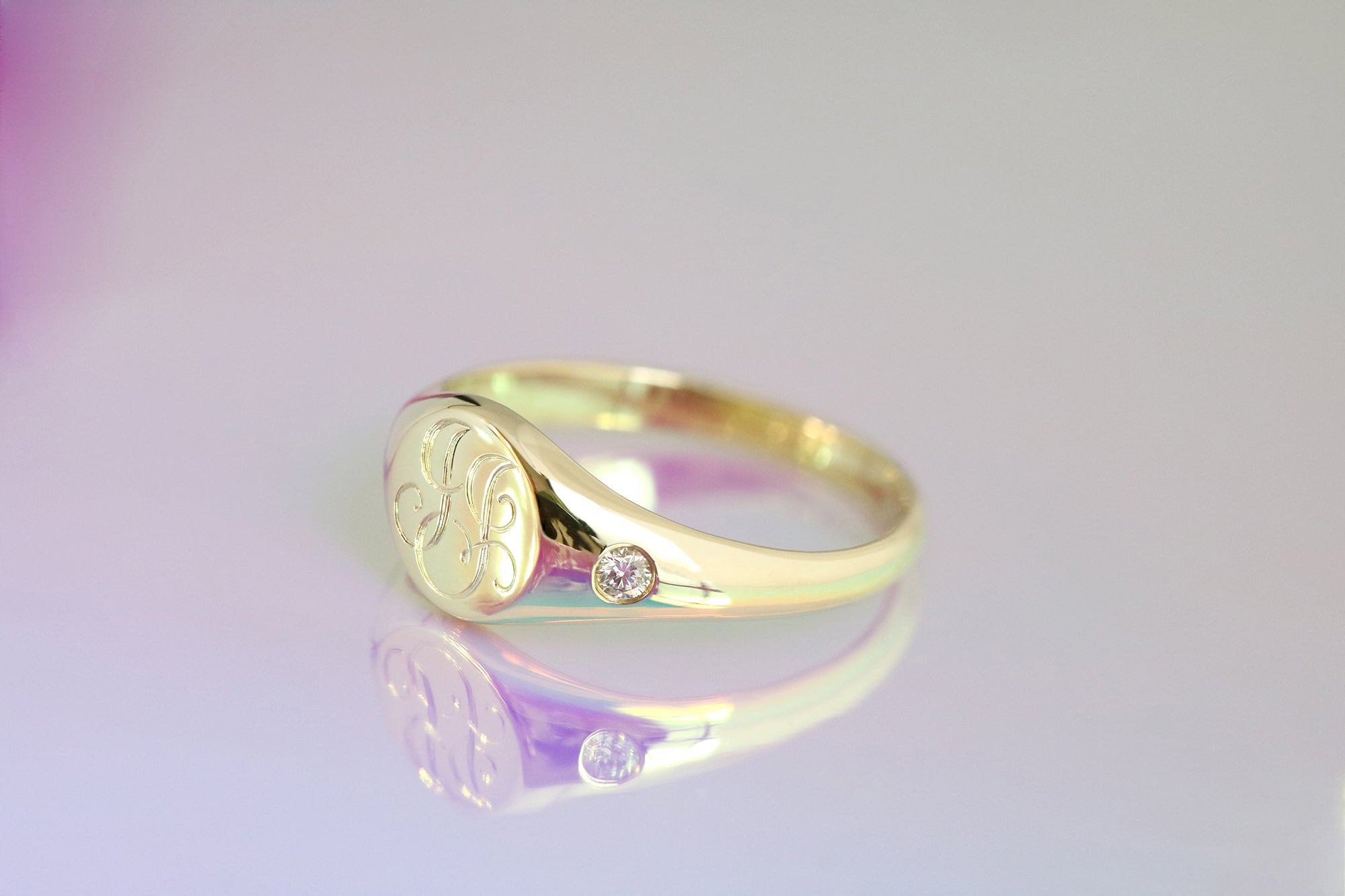 engraved signet ring with diamonds