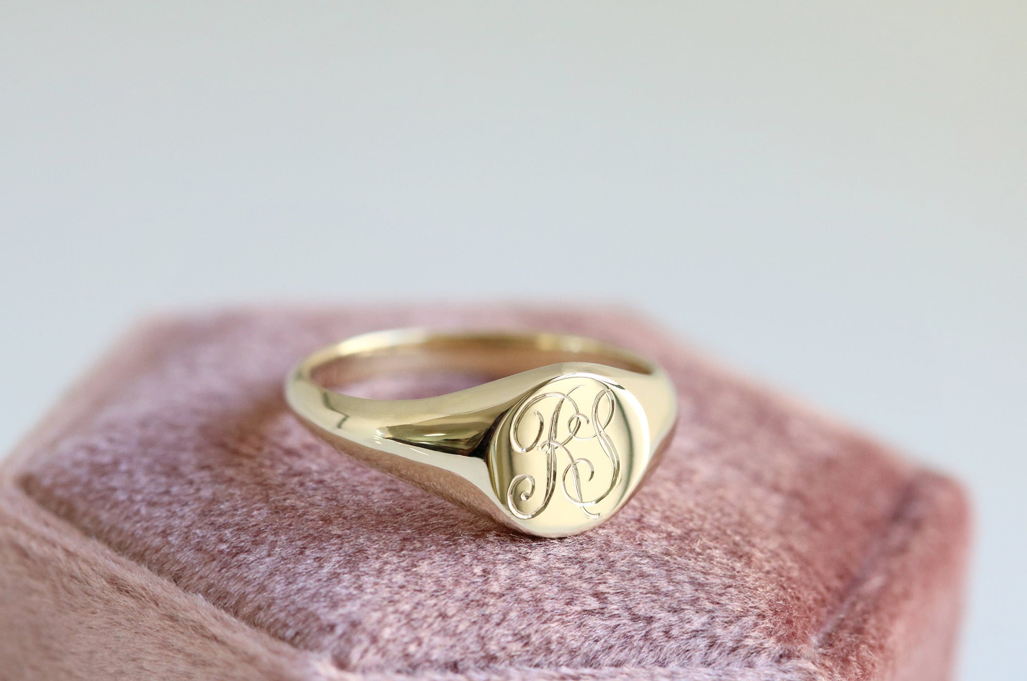 engraved initial signet ring in yellow gold