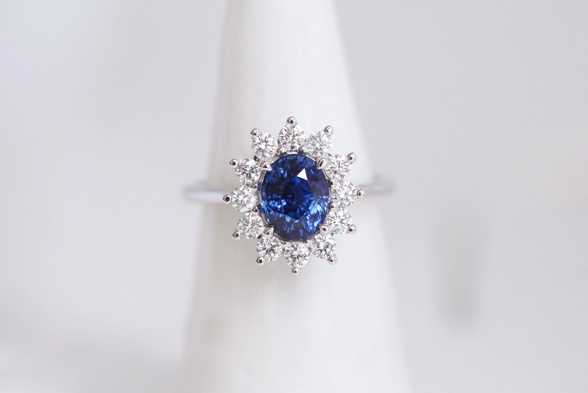 White Gold Engagement Ring with Ceylon Sapphire and diamond halo