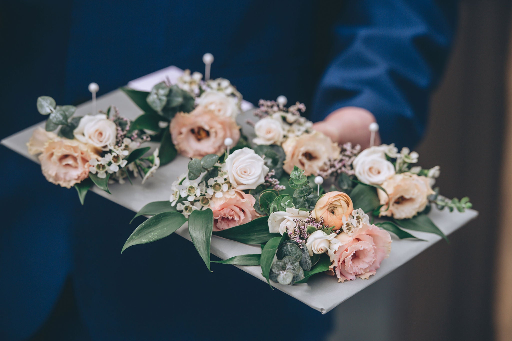 Button holes on card at Trevenna wedding barns