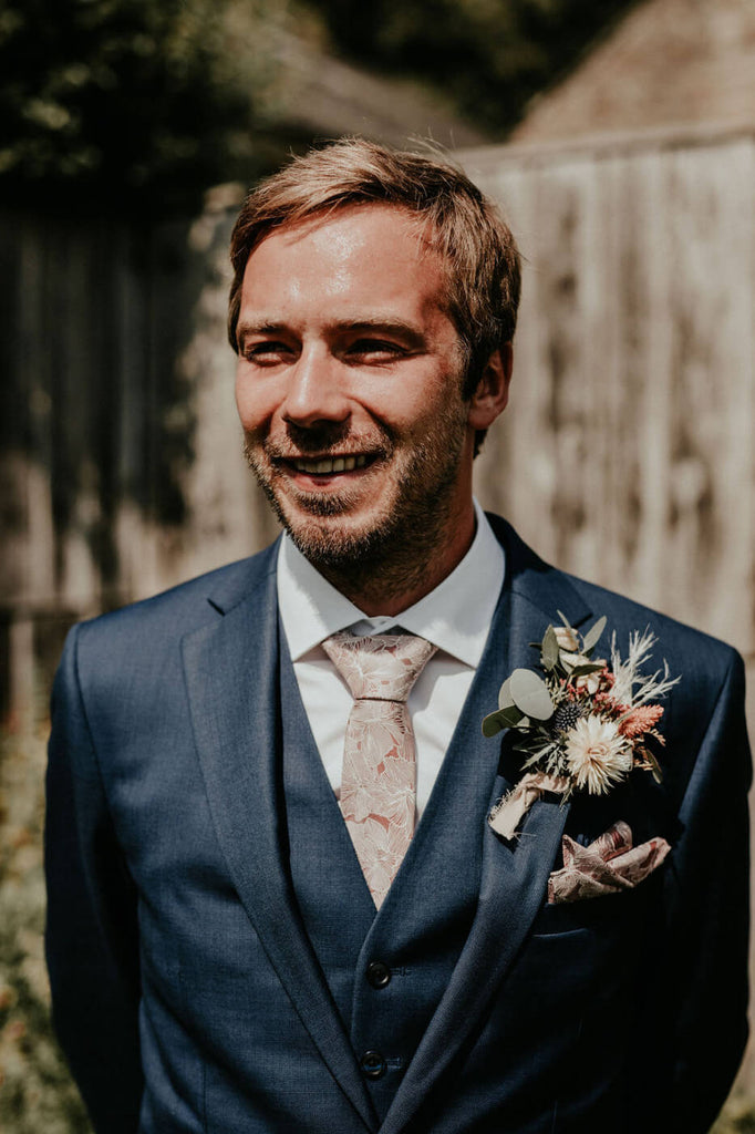 Groom getting ready in the Wagon House Trevenna