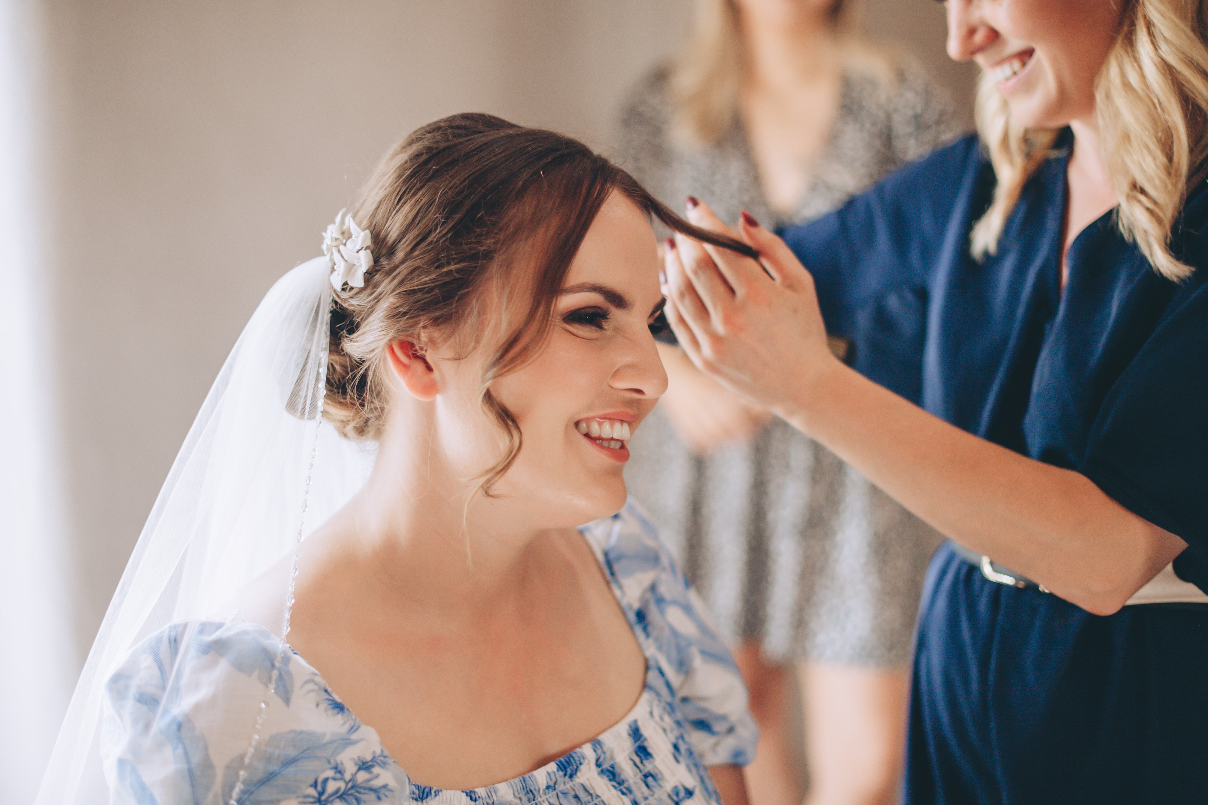 Bride getting ready in the threshing barn