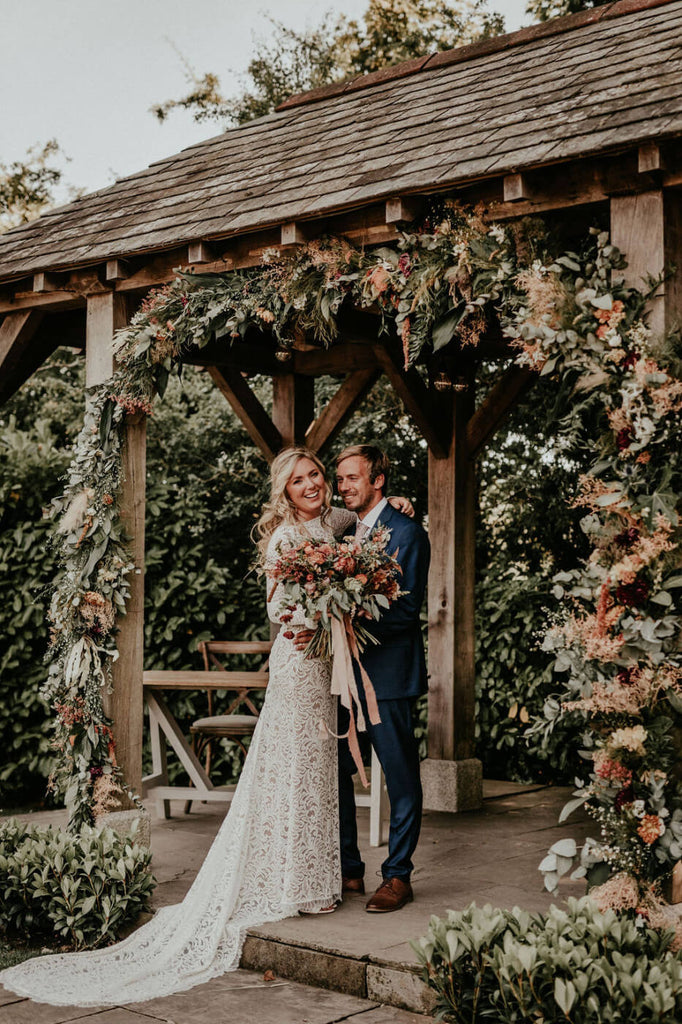 Arbour Trevenna bride and groom smiling