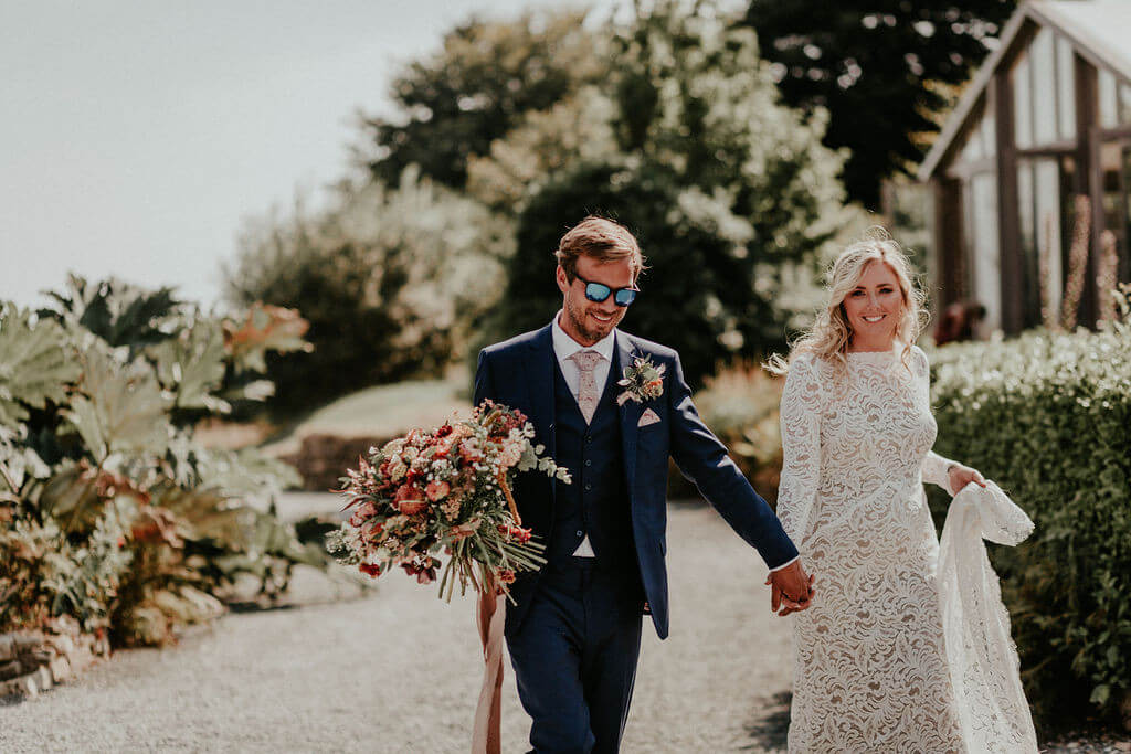 Trevenna bride & groom walking.jpg