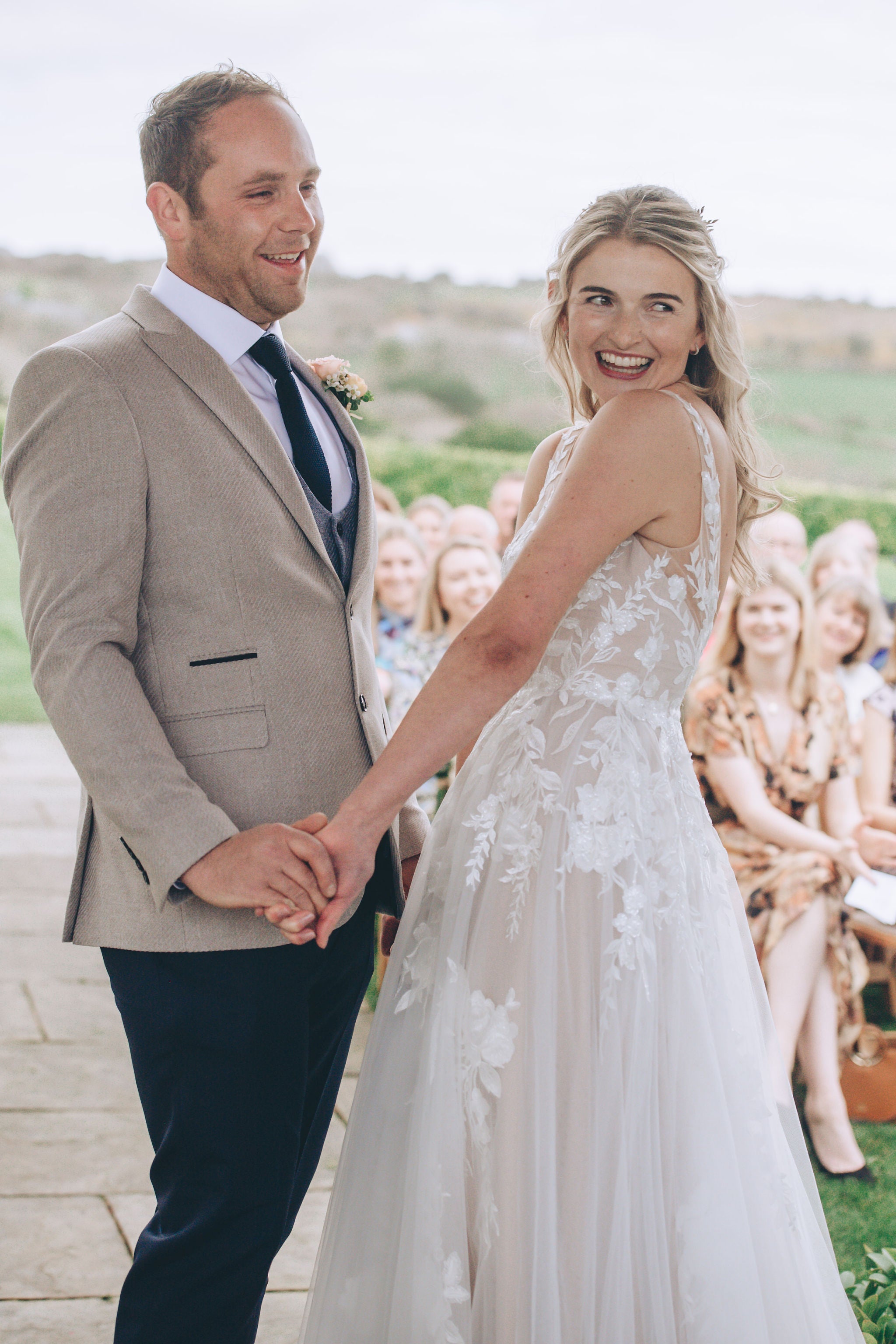 Couple smiling during wedding ceremony at Trevenna
