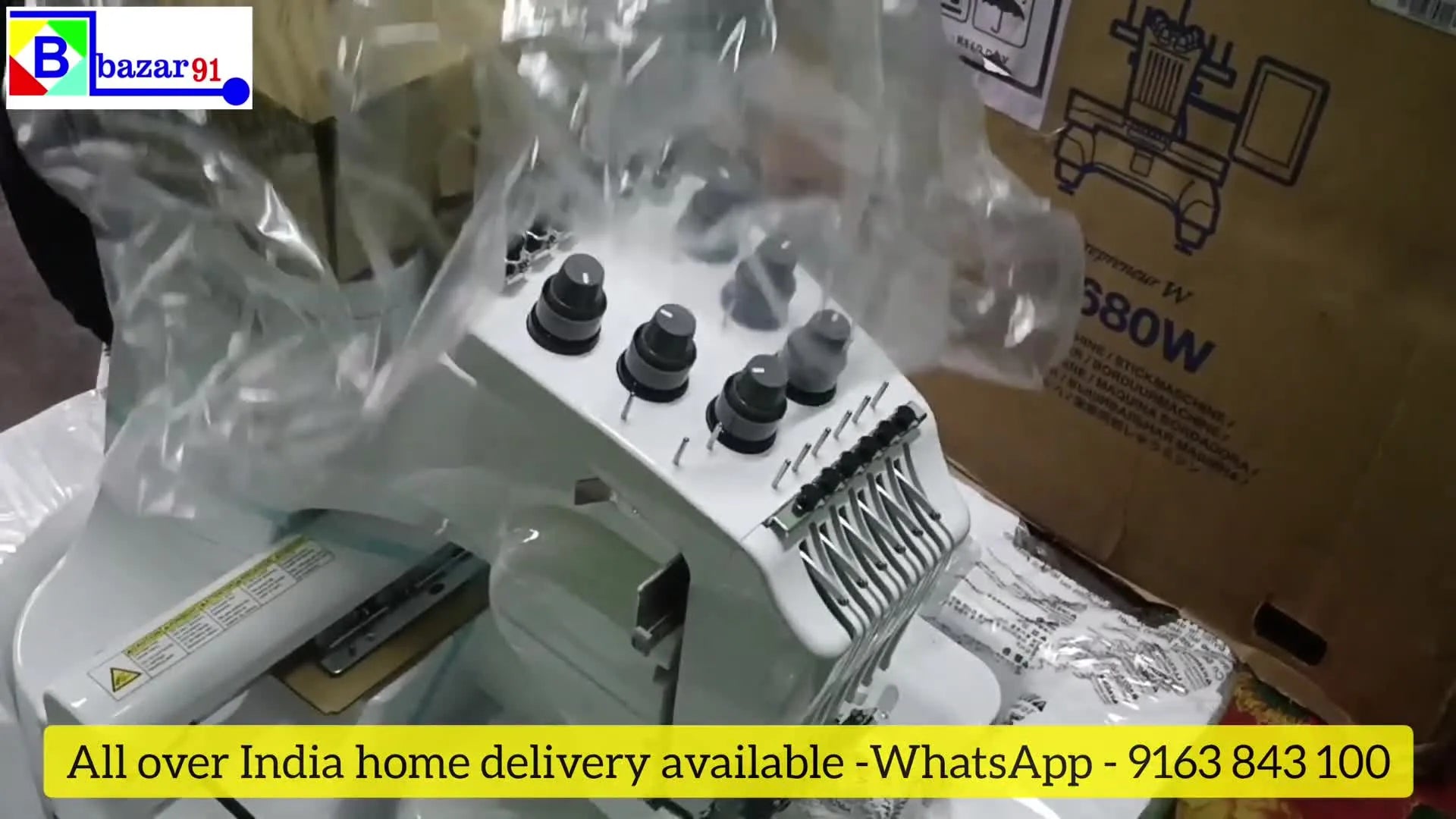 Brother PR680W embroidery machine uncovered from its plastic wrapping, showing multiple needle heads.