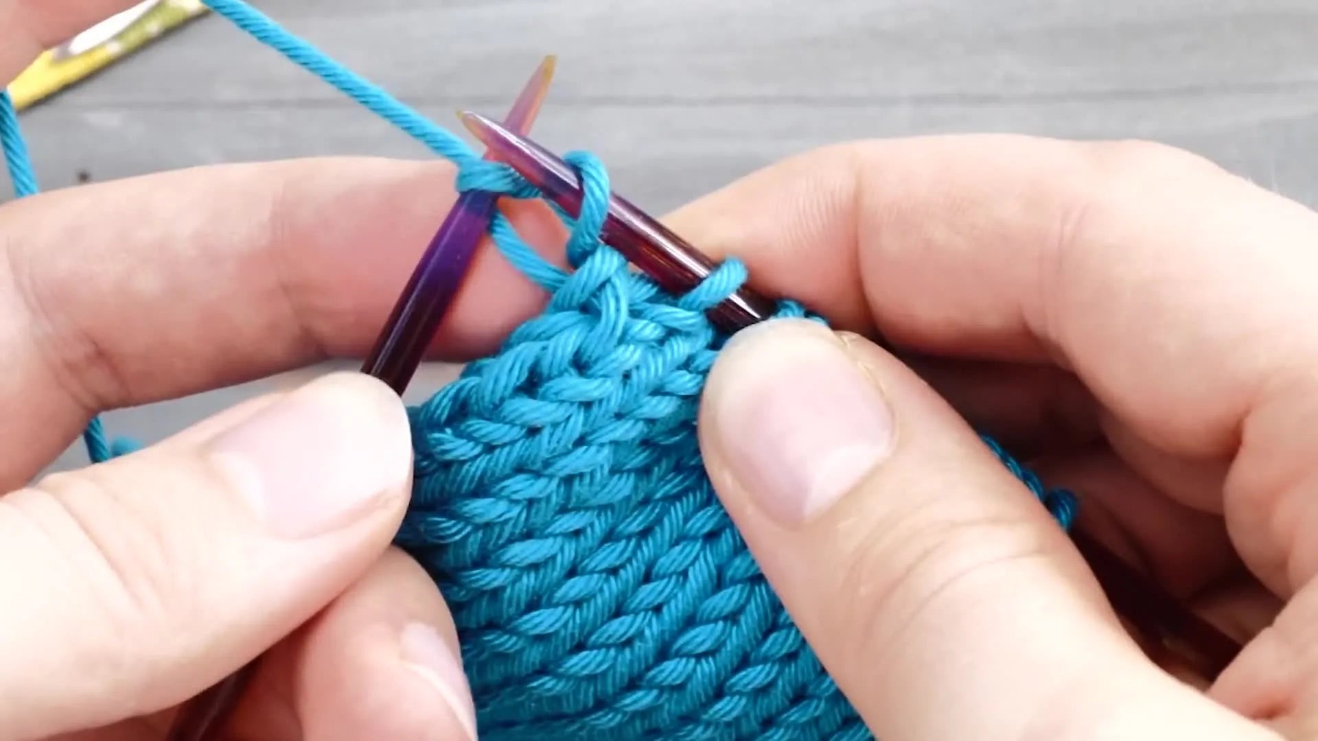 Close-up of the rightmost stitch on the needle appearing enlarged due to accumulated slack.