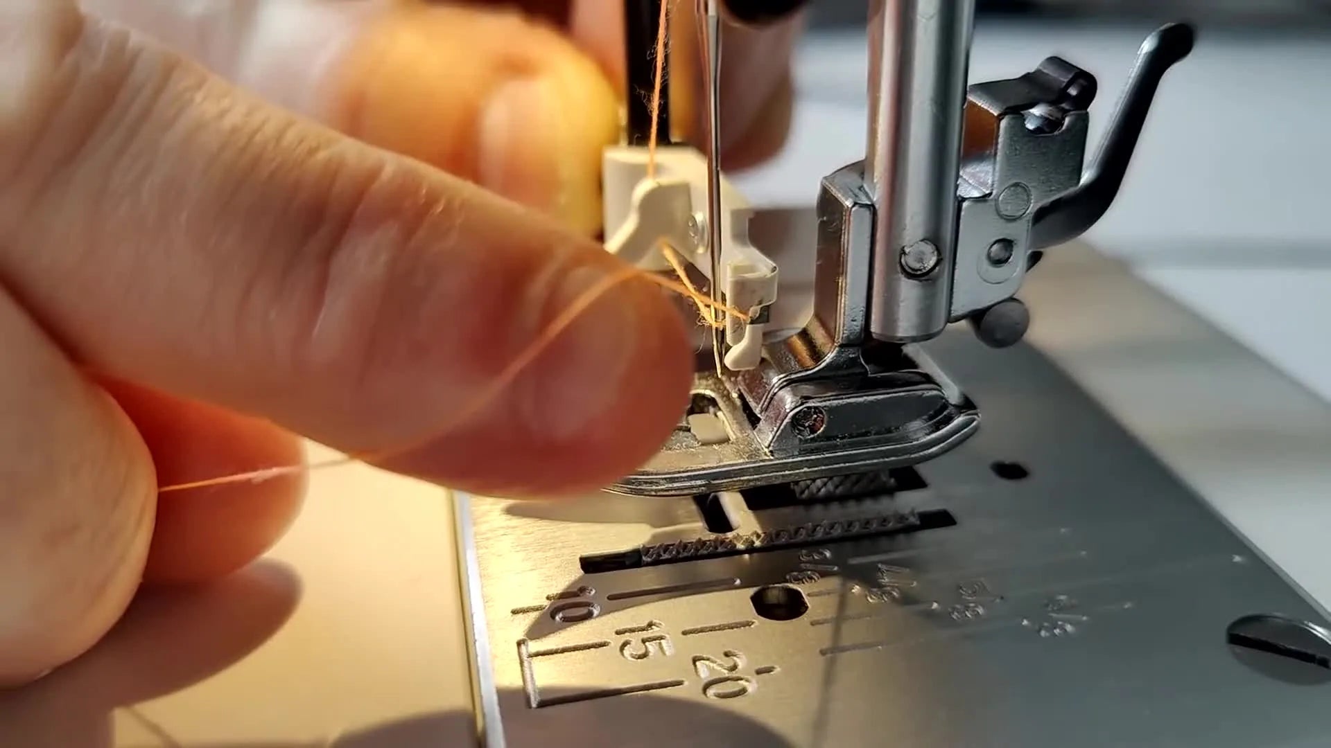 Twisting threader to engage loop on Janome J3-18