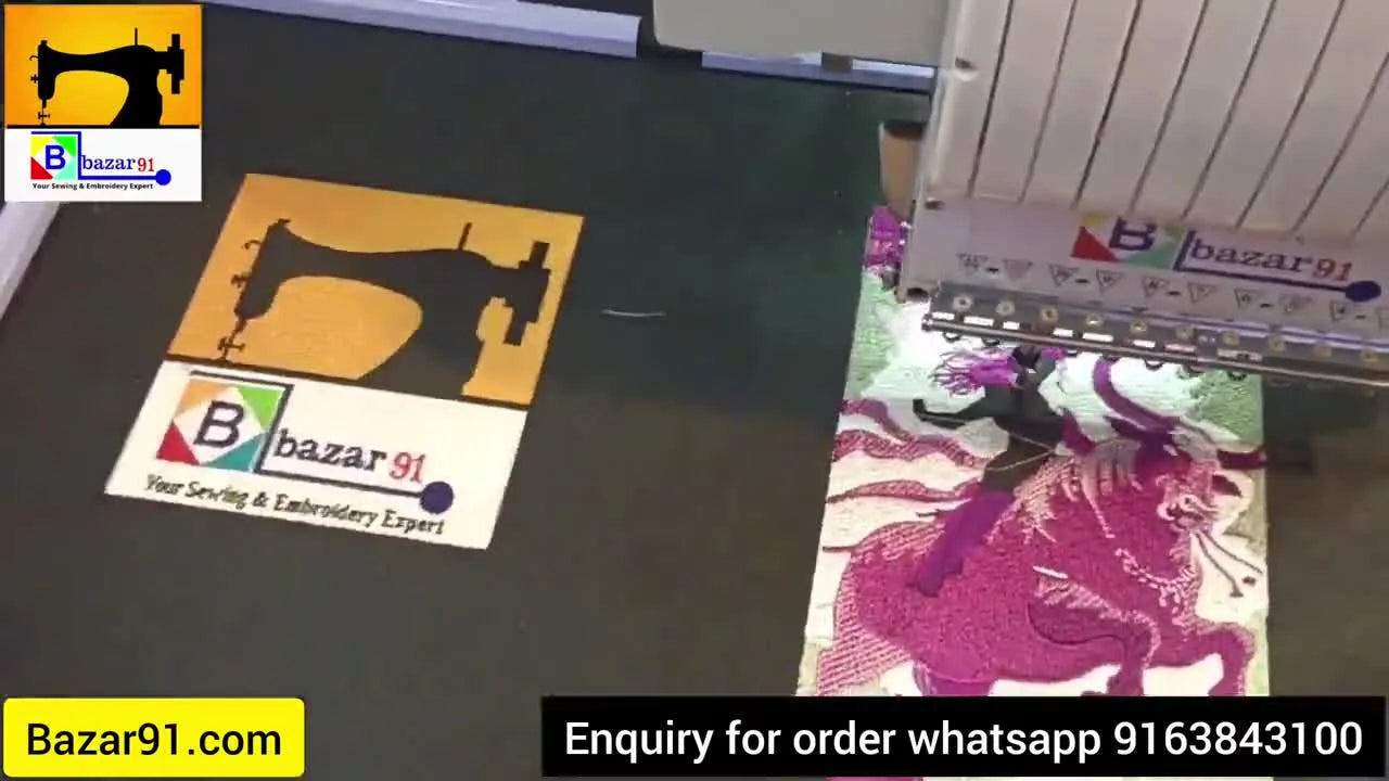 The machine continues to stitch, adding more detail to the design's body.