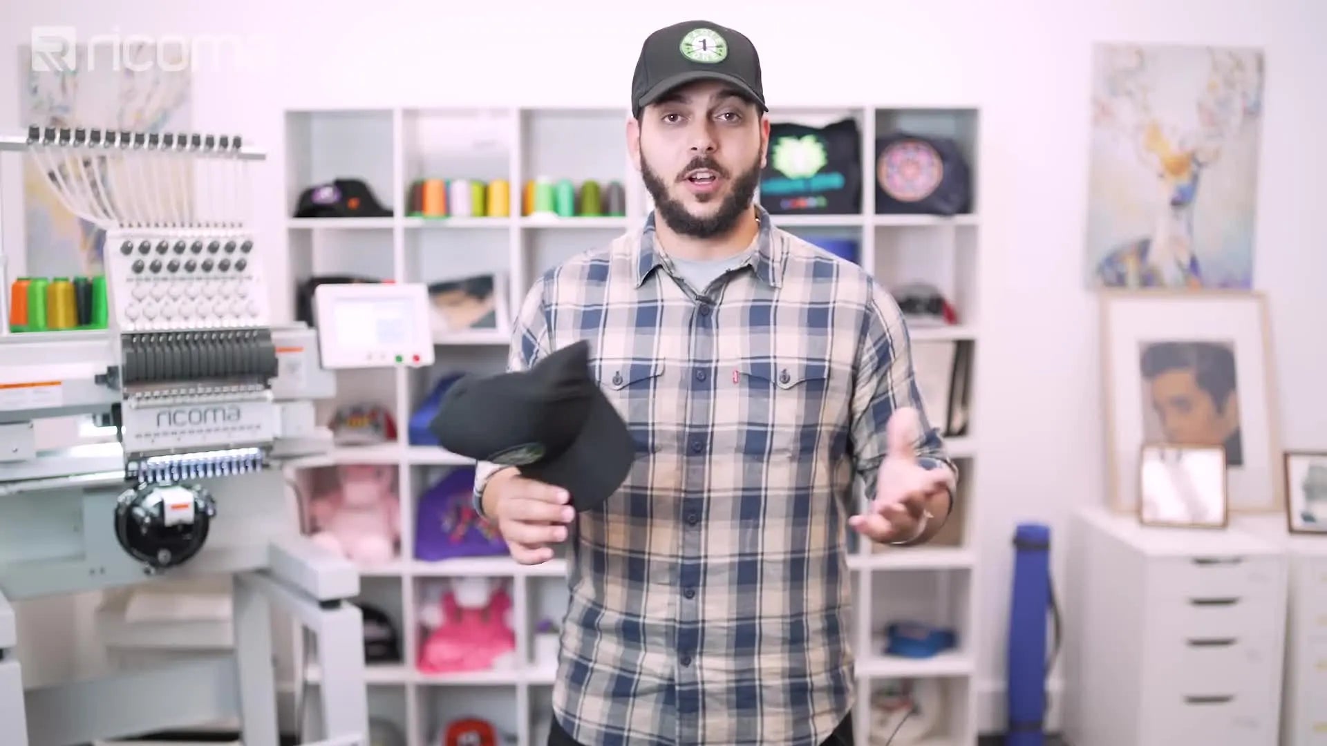 Close-up comparison of a heat-transferred patch and an embroidered patch on caps.