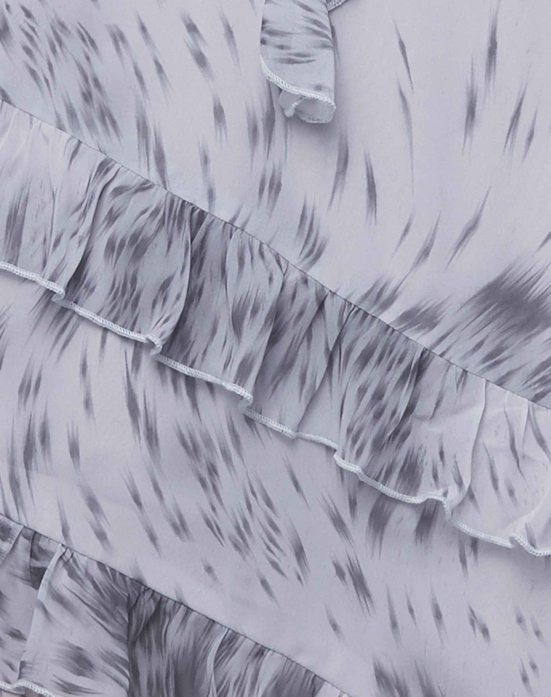 Meredith Halter Ruffle Mini Dress in Distorted Animal Print