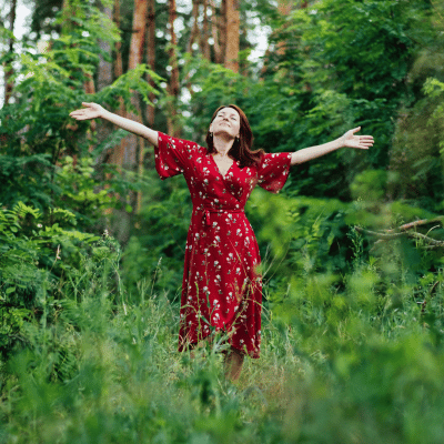 The person appears to be standing or dancing among enjoying what she have