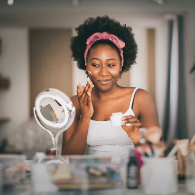 This image shows a woman doing self care routine