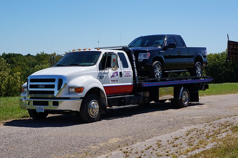 I-70 Towing Services - Flatbed rollback for normal everyday cars and trucks