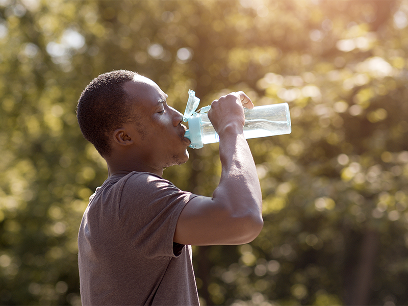 Athlete drinking water