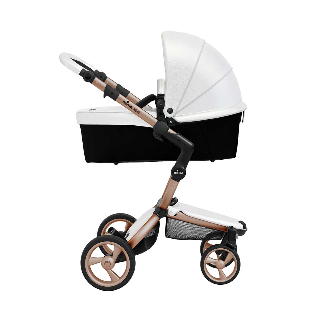 white and rose gold pram