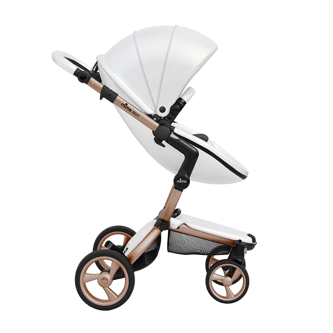 white and gold stroller