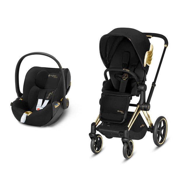 black pram with gold wings