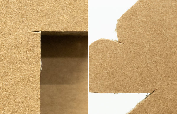 Muscle cardboard = cut marks on heavy-duty cardboard (reinforced cardboard)