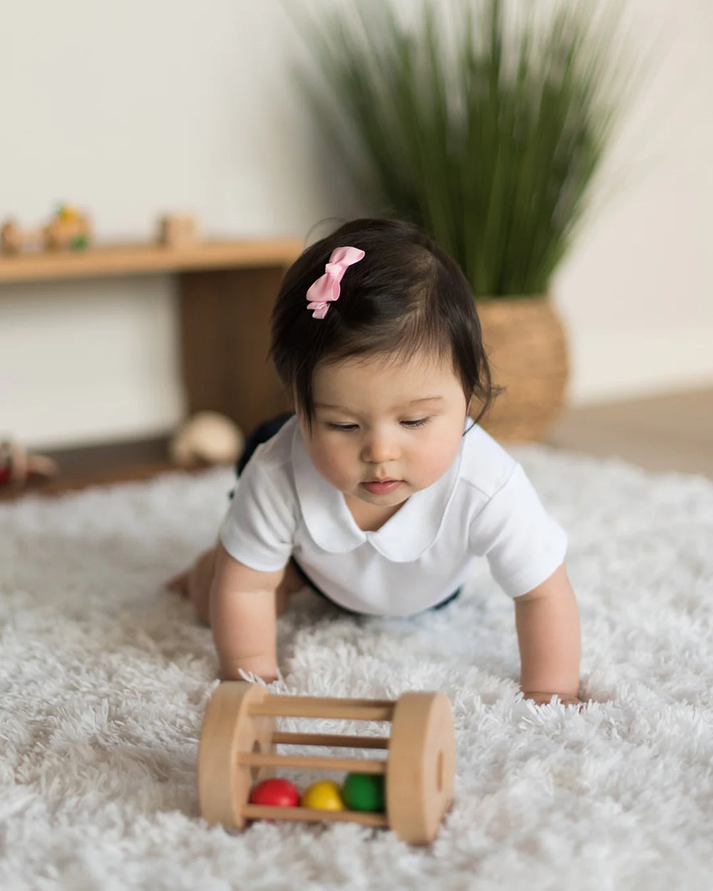 Baby playing with the Rolling Drum