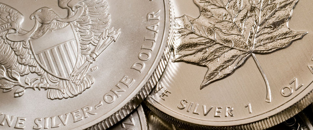 1 oz American Eagle Silver Dollar and 1 oz Canadian Maple Leaf Silver Round
