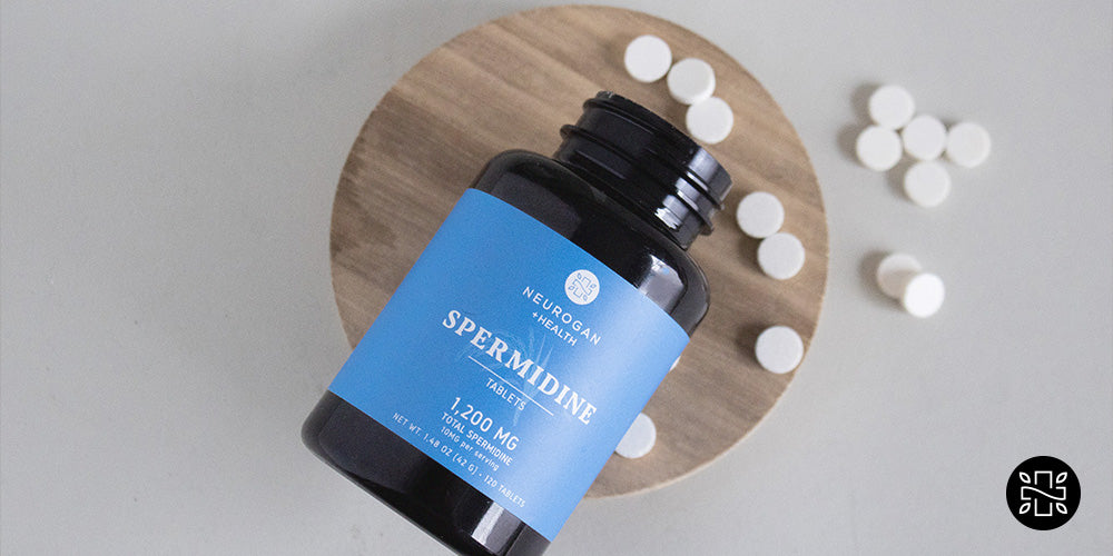 A bottle of Neurogan's Spermidine Tablets, with tablets all around