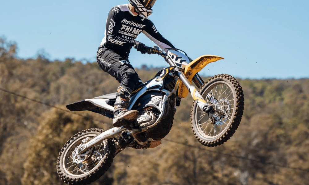 Rider jumping on a Surron Dirt eBike