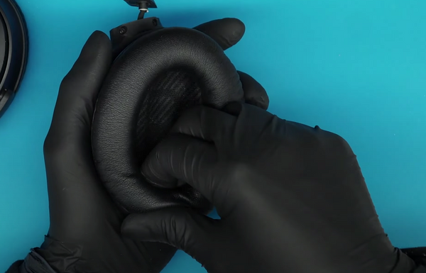 Removing the ear pad from the Right side of the headphones