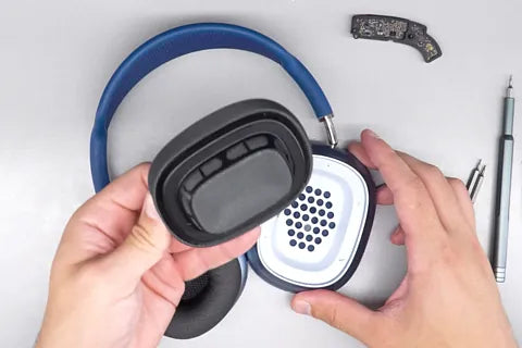 Removing magnetic earpad from headphones.