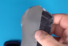 Applying rubbing alcohol to the end of your thin pry tool in order to remove the Apple Watch Series 7 screen