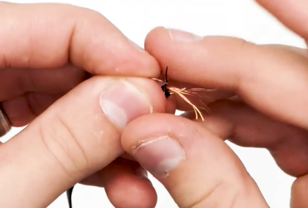 Twisting the copper wires into one larger wire