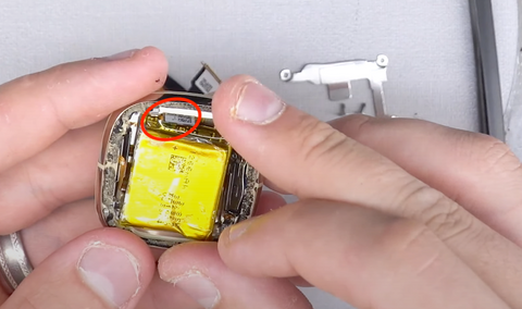 Installing the new Fitbit Sense battery into the watch housing