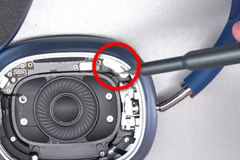 Loosening screws with T2 bit.