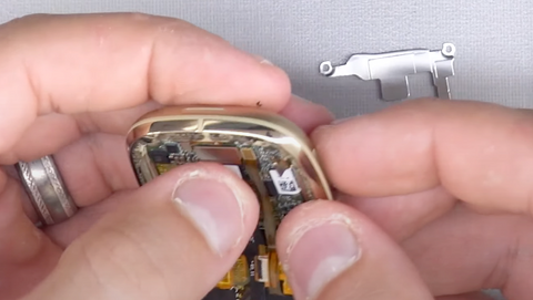 Connect the two Fitbit Sense screen ribbon connectors to their places on the motherboard