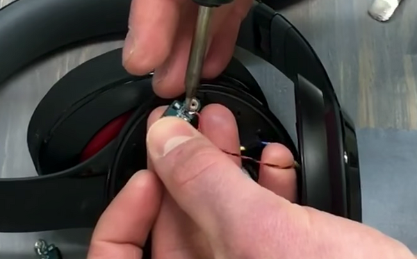 Desoldering the wires from the charge port